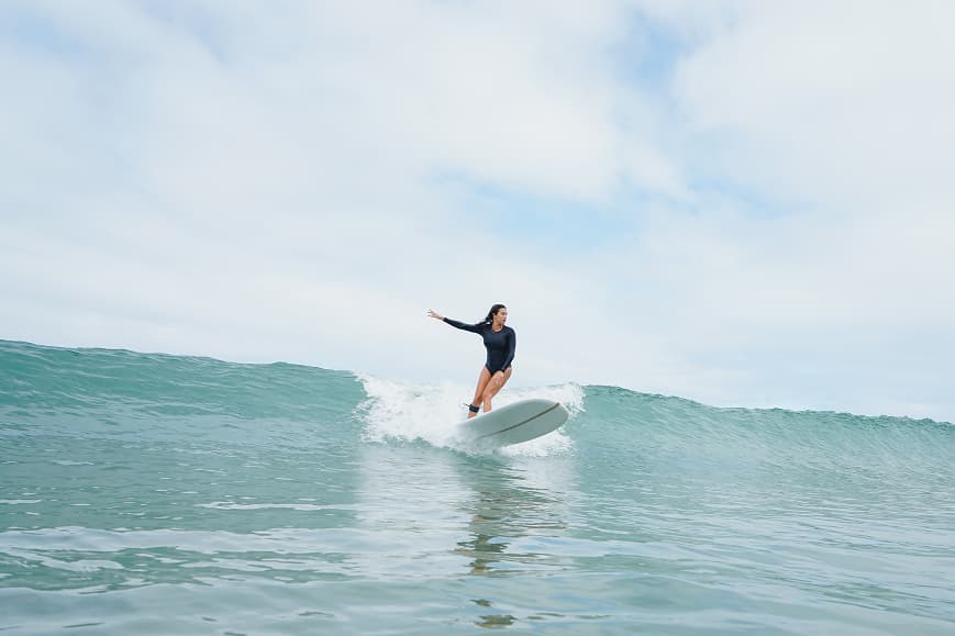 Surfer riding a mellow Atlantic wave in Soulac-sur-Mer France