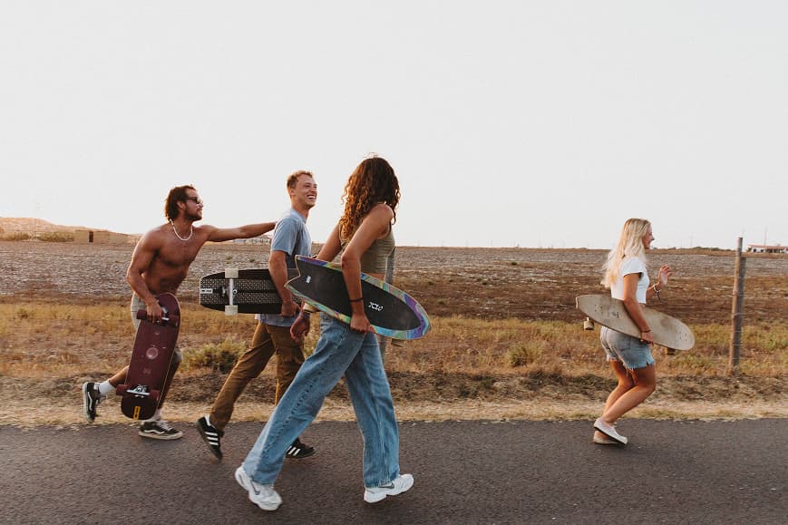 Guests walking with skateboards near Dreamsea Portugal Alentejo