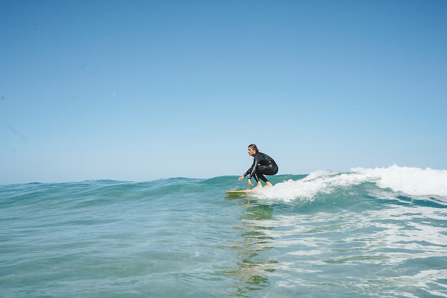 Surfer riding a clean Atlantic wave on the Alentejo coast