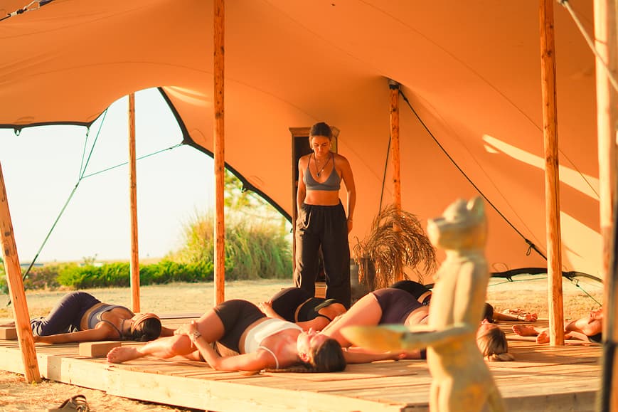 Yoga instructor guiding guests through a relaxation session in the Alentejo shala