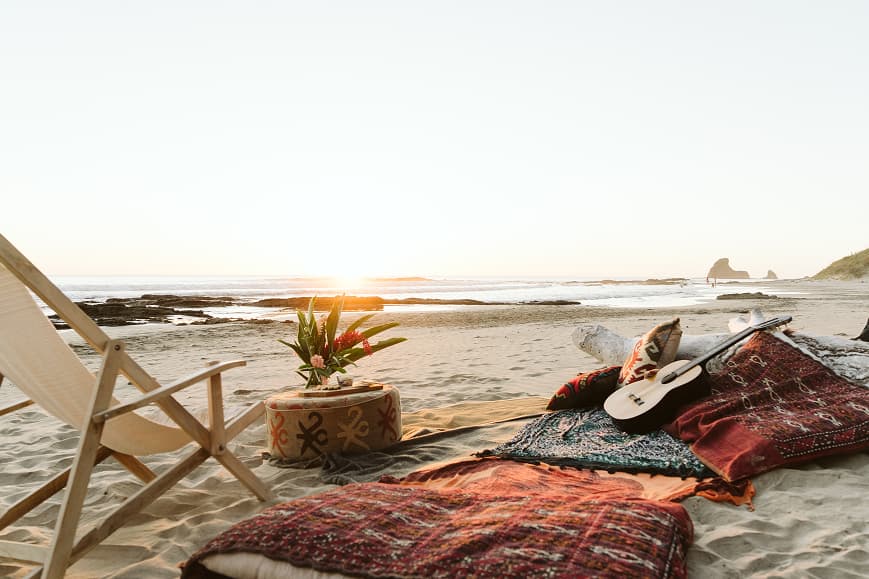 Beach picnic setup at sunset on the Pacific coast of Nicaragua