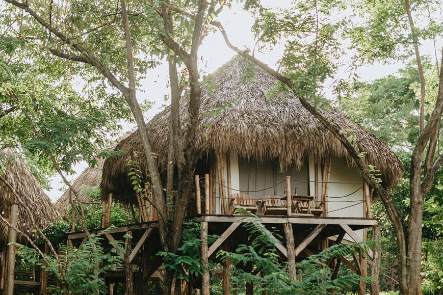 Thatched glamping cabin surrounded by jungle at Dreamsea Nicaragua San Juan del Sur