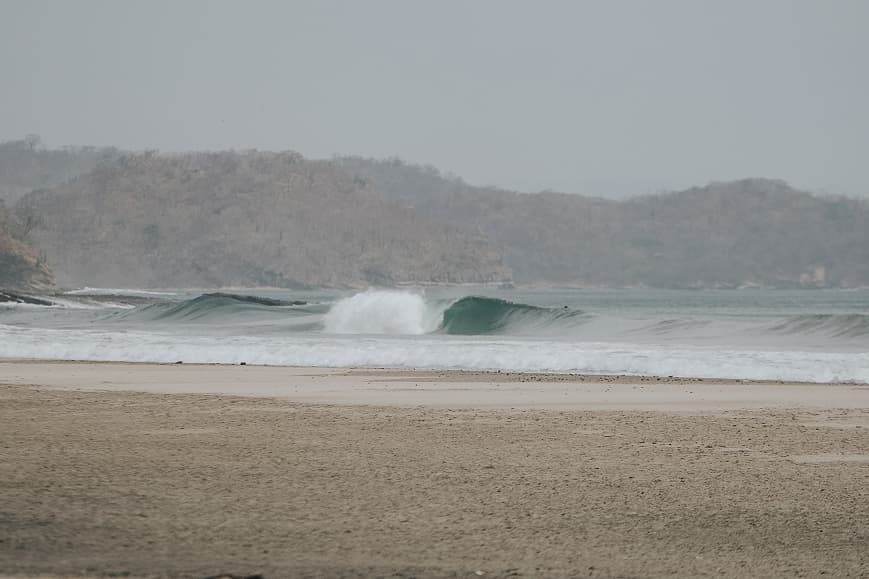 Empty wave breaking on a beach near San Juan del Sur Nicaragua