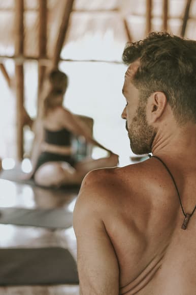 Guests during a yoga class inside the bamboo shala at Dreamsea Nicaragua