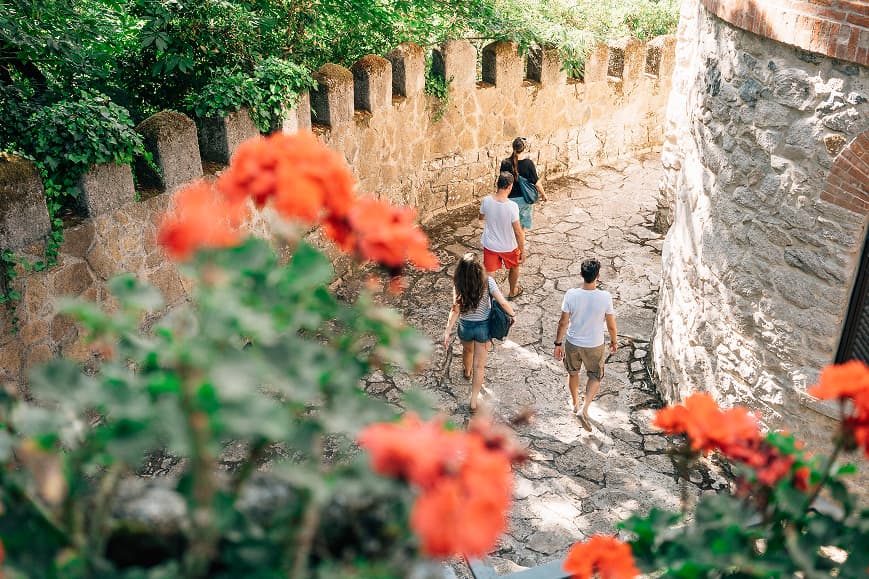 Guests walking through a historic stone path in Sintra Portugal