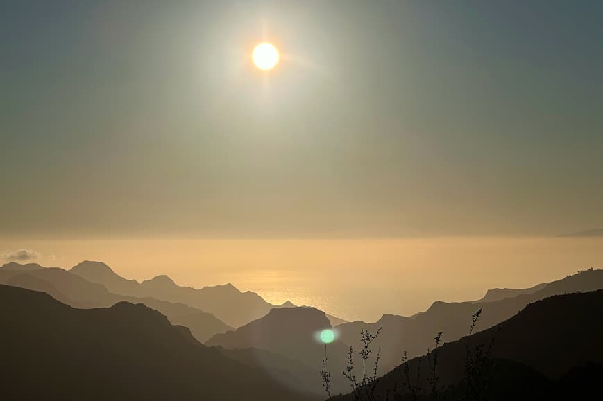 Sunset over the mountains and ocean in Gran Canaria