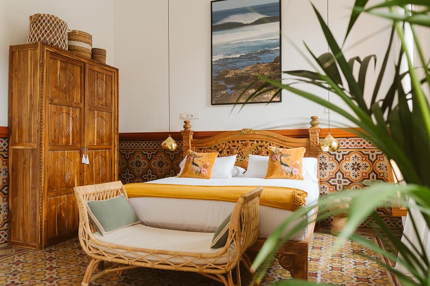 Boutique double room at Dreamsea Gran Canaria with wooden furniture and patterned tile floor
