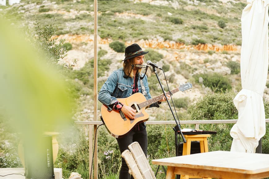 Live acoustic music performance on the terrace at Dreamsea Mediterranean