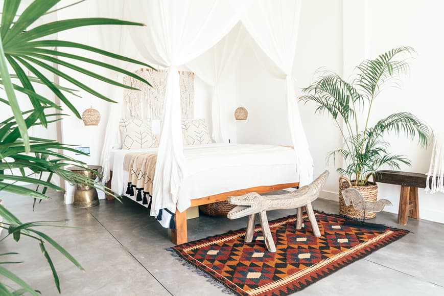 Bright beachfront room at Dreamsea Sri Lanka Ahangama with canopy bed, tropical plants and natural decor