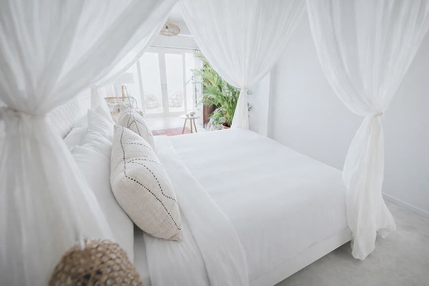 Bedroom at Dreamsea Surf Camp Lombok with natural decor